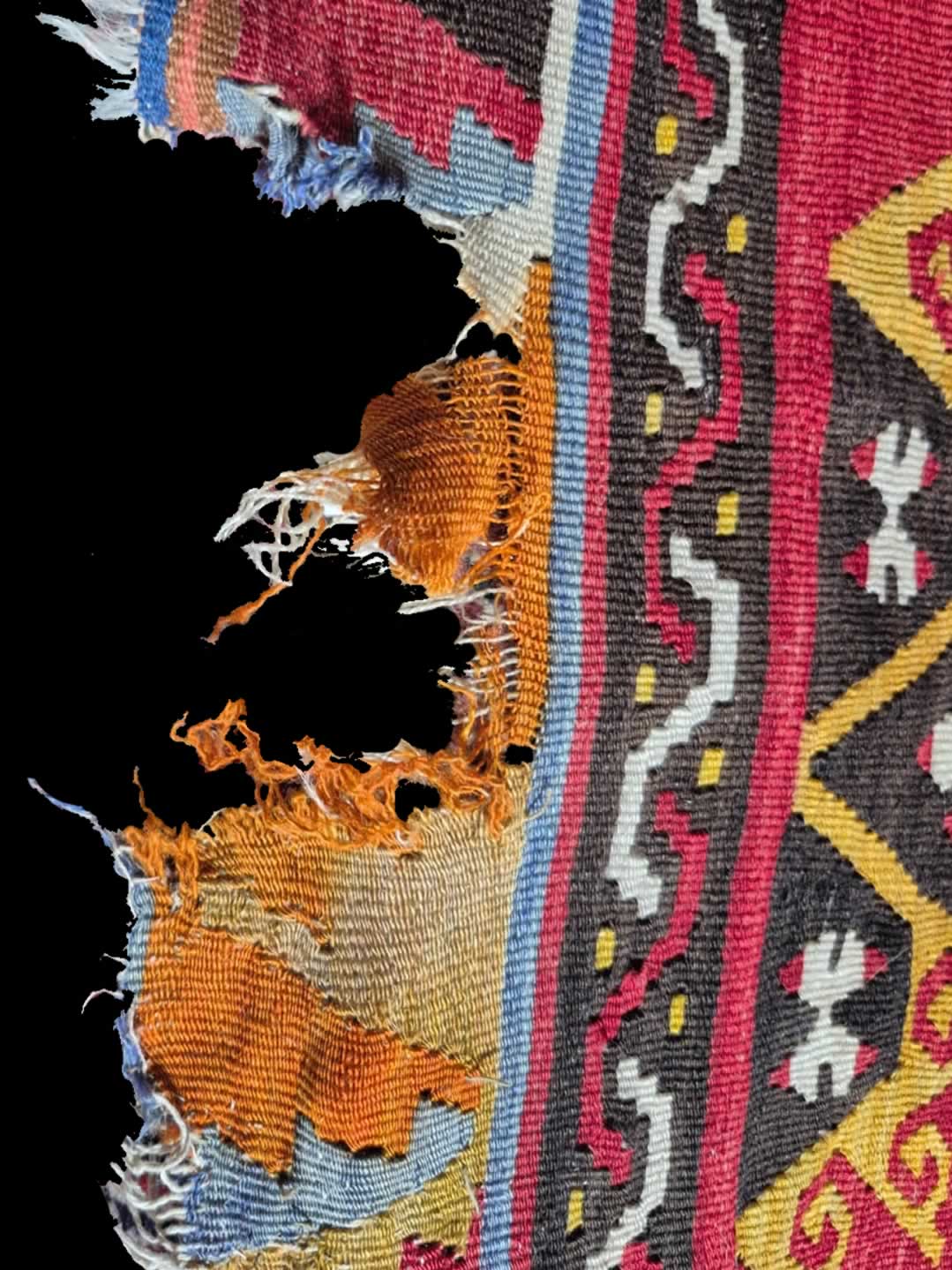 Kilim ragged edges and missing partern sections before repair / restoration
