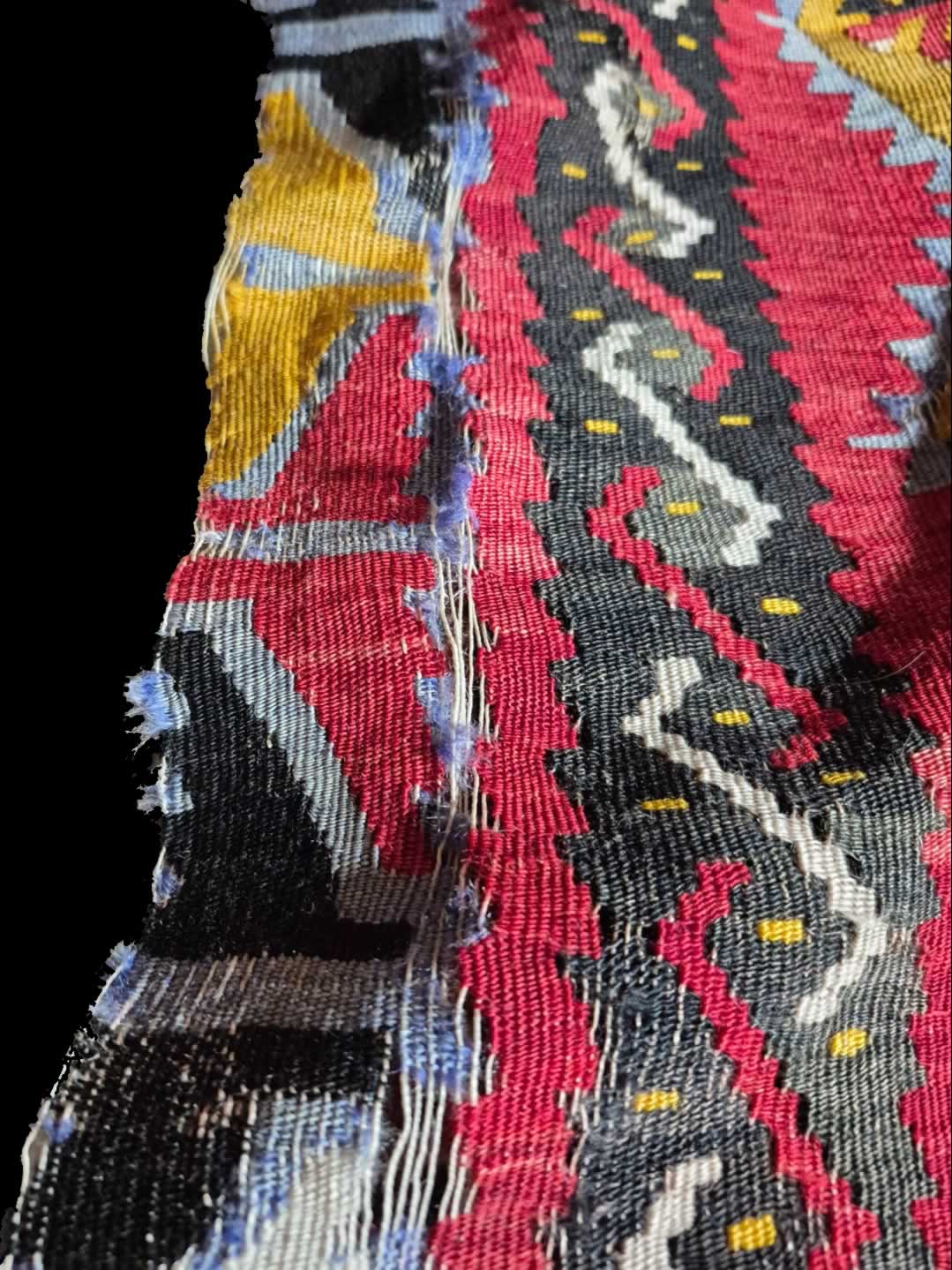 Threadbare and weak section Kilim